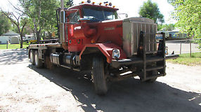 Oilfield Winch Truck 81 Autocar Tandem Axle Bed Truck with Gin Poles image 1