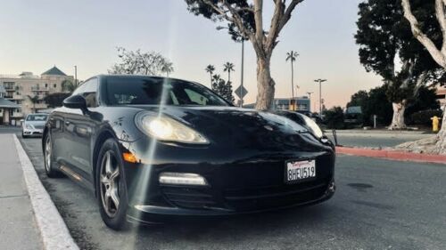 Panamera hatchback; excellent condition interior; back up camera; new paint job