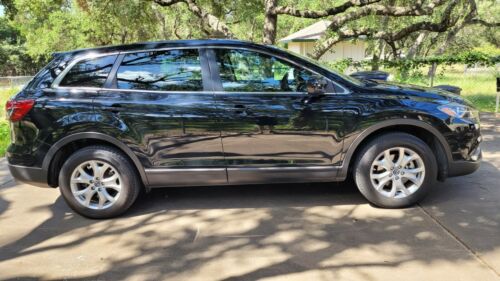 Like new, this 2015  CX-9 Sport, 273 HP V6 is clean and roomy.