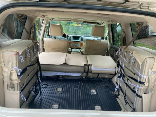 Loaded champagne exterior and tan leather interior.No rust; custom seat covers image 7