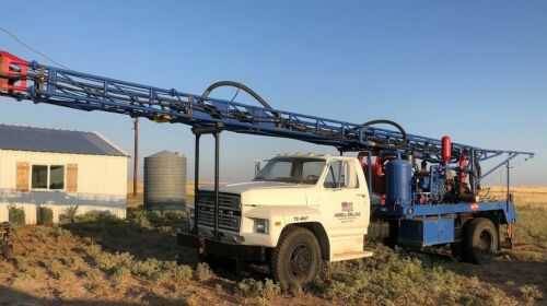 Nice Mayhew 1000 Water Well Drilling Rig on 1982 Ford F700 image 1