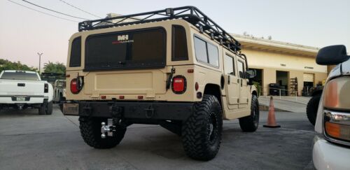 1994 Hummer H1 4 Door Waggon, new leather interior, towing, and much more image 2