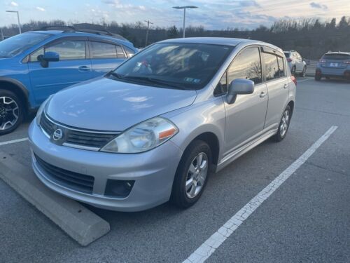 Brilliant Silver Metallic Nissan Versa with 92522 Miles available now!