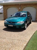 Ford Laser LXi (1998) 5D Hatchback 4 SP Automatic (1.6L - Multi Point F/INJ) image 5