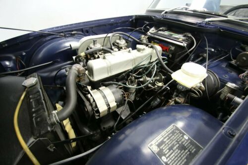 classic vintage chrome British sports car drop rag top manual transmission image 2