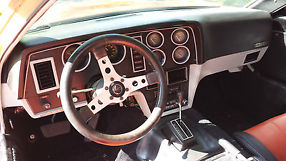 1975 Bricklin, red, daily driver.Custom interior image 5