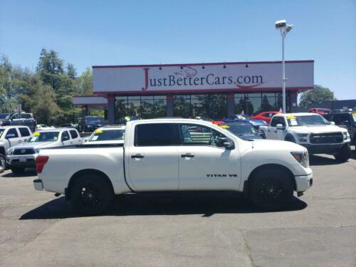 Pearl White Nissan Titan with 25002 Miles available now!